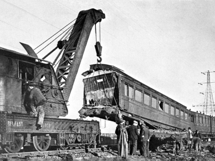 10/1/1945: GNR steam crane 2 lifting the railmotor at Ballymacarrett after crash. W Jones, crane driver, at crane cab.