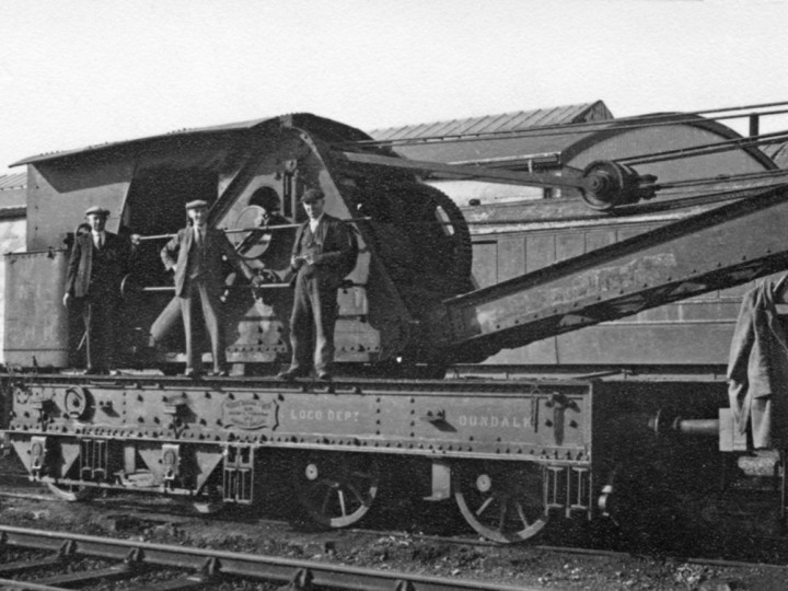 September 1957: GNR Crane No.1 beside Carriage Paint Shop, Dundalk with M Lennon, T McEvoy and H Cummings. (Paddy Mallon)