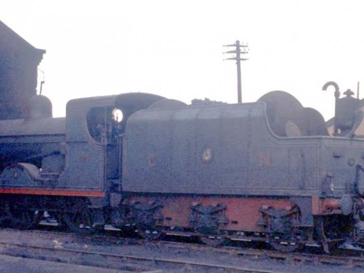 17/12/1960: U class No.197 'Lough Neagh' and tender 43 at Amiens  Street shed. (D. FitzGerald)