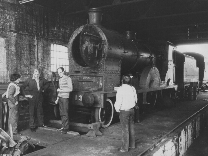 1985 (May): On the occasion of a railtour, probably the 'Cork 800', Peter Scott inspects No.131 in Mallow shed in GSRPS days. (B. Pickup)