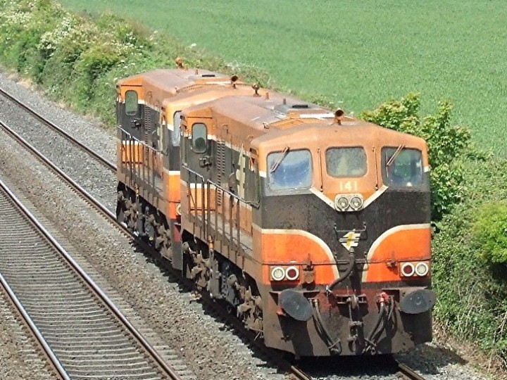 Two RPSI locomotives! In more recent times, 141 was repainted into the 'three pin plug' livery she is seen wearing here. Seen here south of Mosney and in company with 175 she is probably returning to Connolly for refuelling. (B.Pickup)