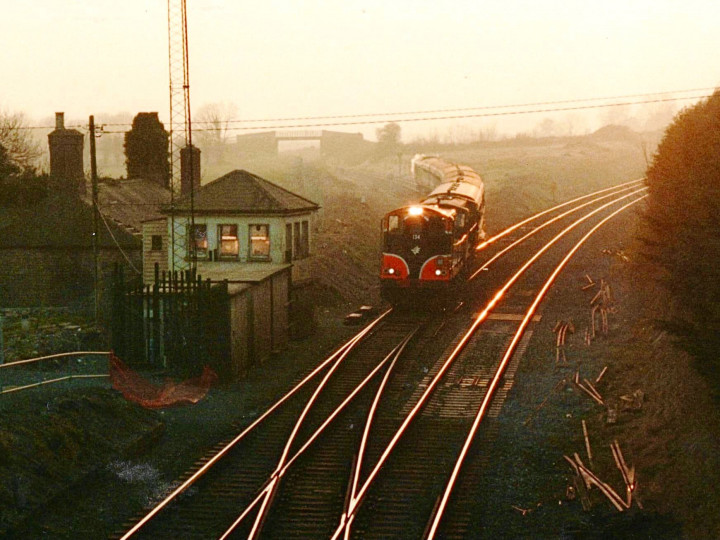 March 2003: 134, coupled to a B141 locomotive, come off the Waterford line at Cherryville with an ITG tour train. (P. Newman)