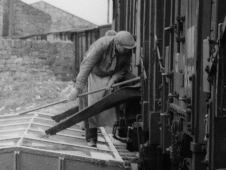 29/4/1961: Unloading chutes in use on one of Scotts grain vans at Omagh General goods yard. (D. Coakham)