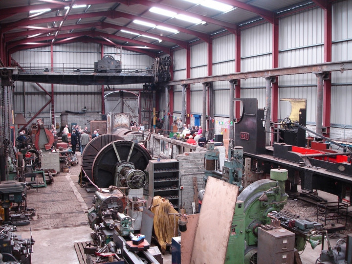 4/7/2006: Official opening day, and a view of the speakers inside the workshop. The large machine in the middle of the workshop is the wheel lathe, whilst the overhead crane is seen visible at the far end.