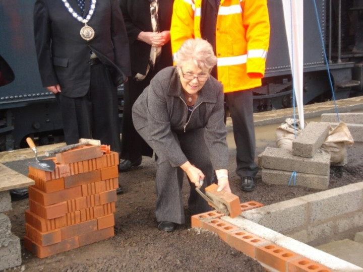17/10/2017: Invited guests attend a ceremony at Whitehead to mark the official laying of the first brick. The brick was laid by Vera McWilliam of major sponsor GROW. (P. McCann)