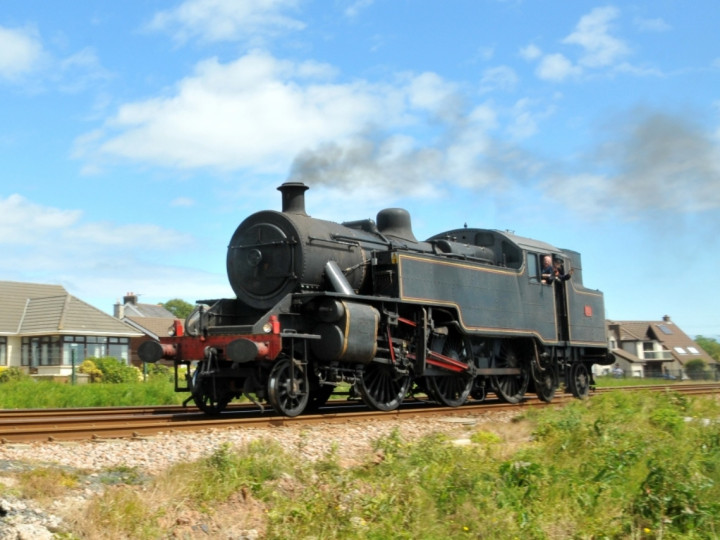 14/6/2015: A light engine trial to Carrickfergus passing Eden. (C.P. Friel)