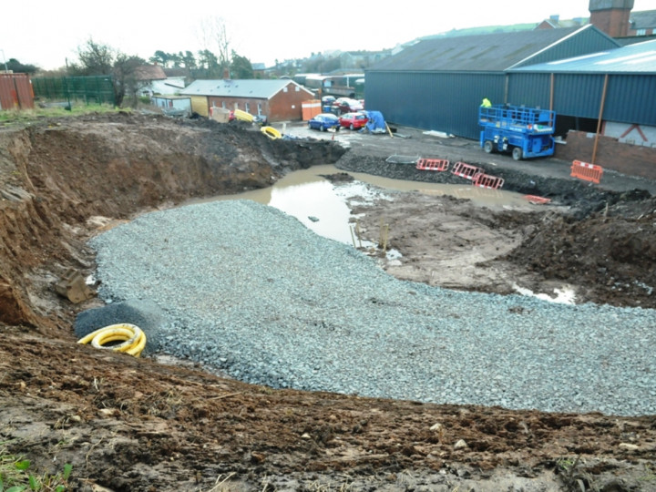 13/2/2016: A view across the turntable pit along the route of the access between the Stables and No.5 Loco Shed wall. (C.P. Friel)