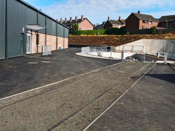 19/7/2016: The track to the turntable embedded in the access lane to the rear, but not yet connected to the yard layout. (R. Thompson)