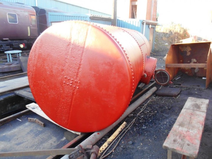 Under the gantries on 5th November 2016, HEI have shotblasted the tank and the site squad have painted it in red oxide primer. Once the tank gets undercoated and the wooden cradle re-made and fitted to the frames, the tank will be able to go back in again. (M.Walsh)