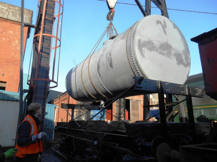 The Larne-end gantry is used to lift the tank onto the frames which No.3BG has pushed into position. (M.Walsh)	