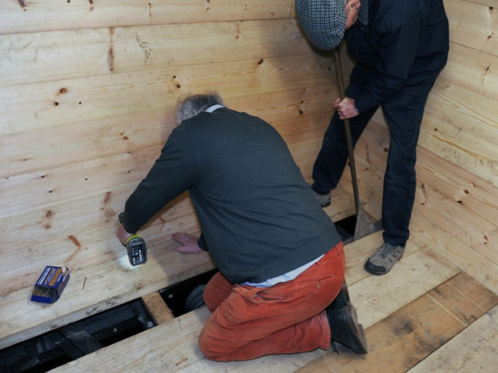 15/1/2020: Mark Kennedy and Richard Kenny attend to the final fitting of new floor timbers. (C.P. Friel)