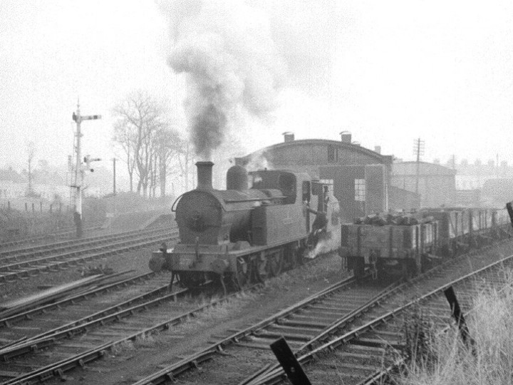 18/9/1967: No.27, still a UTA engine, is seen hauling the Guinness engine from Carrickfergus goods shed, where it had been stored, before working it to our base at Whitehead. The more economical Guinness engine has now taken the shunting and train rides roles previously filled by 'Lough Erne'. Later that year the engine was transferred to the new company Northern Ireland Railways. (J. Lockett)