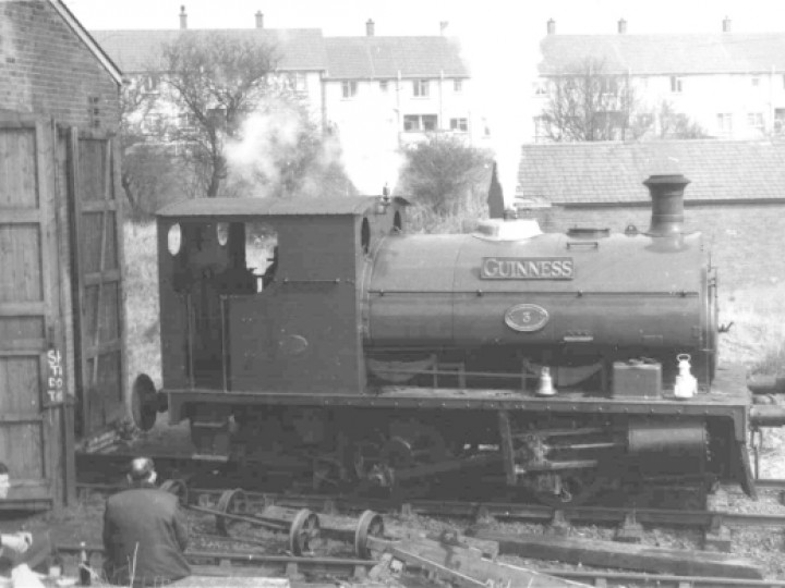 No.3BG 'Guinness' outside the RPSI's Whitehead depot in the 1970s. Railtour Organiser Craig Robb on the left and Chairman Roy Grayson on the right. (J.Lockett)