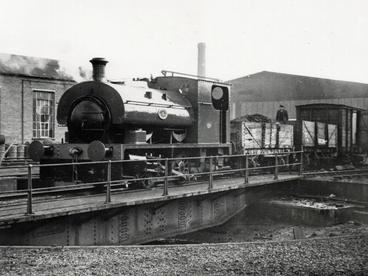 The locomotive doing some work for NIR back in 1968 - pictured shunting a wagon of ash from the turntable at York Road. Note the brackets in place to receive the 'Guinness' nameplate.
 (J.A.Cassells)