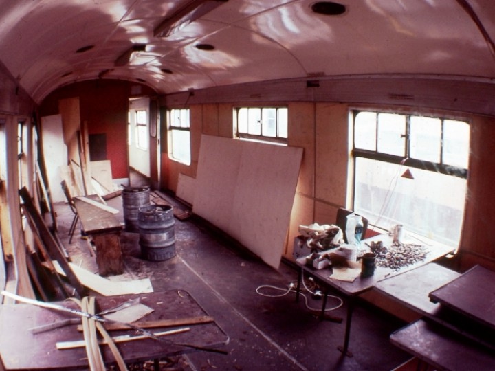 Rarely can a coach be purchased and put into traffic immediately. 87 had a leaking roof, a damp interior, rotten structural members and a host of other problems. Stripping and refurbishment of the interior can be seen in progress in this early 1980s view.