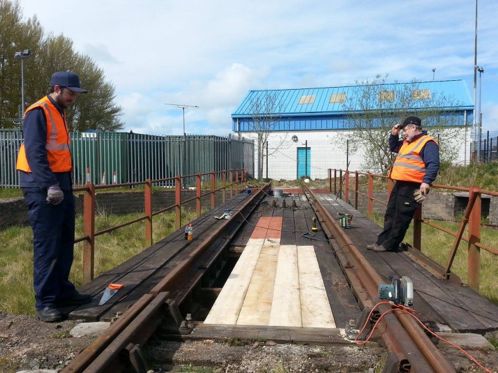 28/4/2016: Matthew and Roy take a break from renewing some of the table timbers. (D. Campbell)