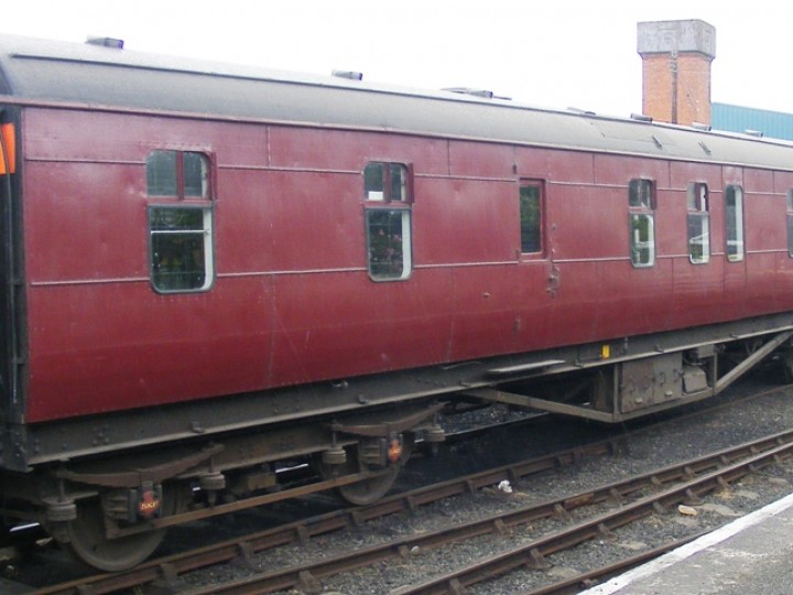 Out of main line use, 87 could easily have slowly deteriorated due to neglect. Fortunately it was decided she would have a new role - as a static tea room on our 'Summer Steam' open days at Whitehead. But the dining car was looking down at heel - financial constraints and lack of volunteers had meant that for her last years on the main line 87 had carried this maroon paint scheme, with no lining and one side had nolettering. Internally the carriage looked tatty and in need of overhaul.