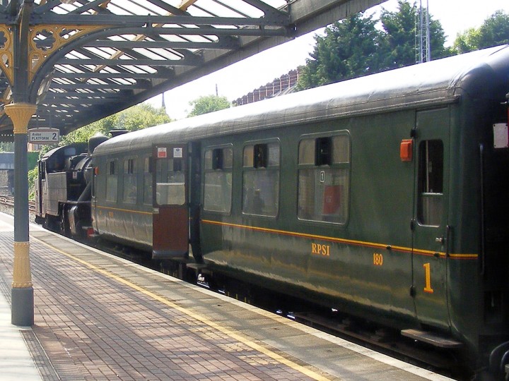 Mk2 180 at Dundalk on 12th May 2008. Locomotive No.4 is hauling the return 'Barrow Bridge' railtour train from Dublin to Whitehead. Here it is waiting to operate a local trip back to Drogheda. (C.P.Friel)