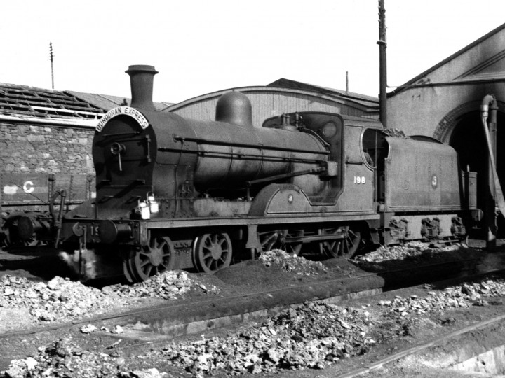 July 1956: U No.198 'Lough Swilly' with tender 43 at Dundalk running shed before working the Down Bundoran Express. (G.H. Burton)