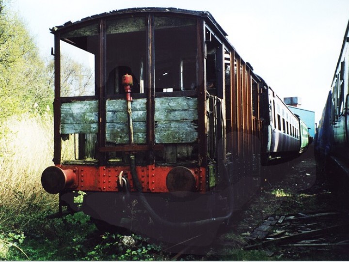 81 shortly after the fire, with the non-original vacuum brake equipment attached to the outside of the Larne-end veranda.
